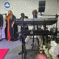 Keyboardist and vocalist leading worship music