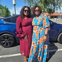 Two women dressed up outdoors for an Easter outreach event
